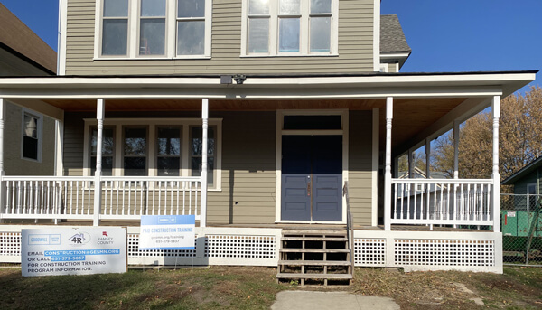 Photo of the remodeled front porch of the house.  
