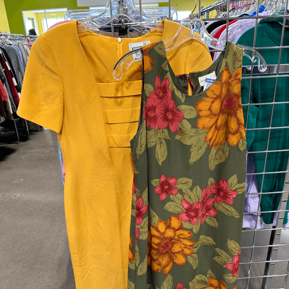 Marigold dress and a floral green, red and marigold dress