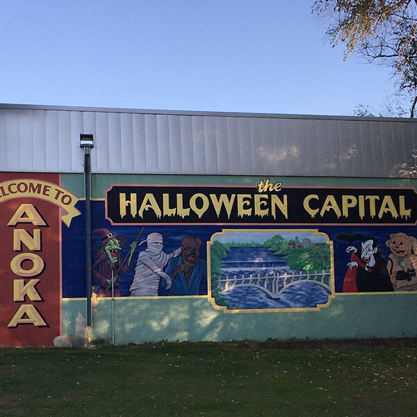 photo of a side of a building with a halloween themed mural
