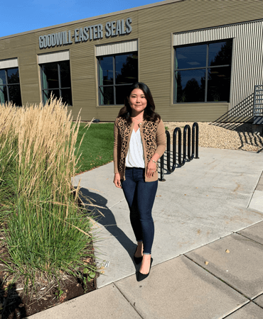 Photo of Younga, a GESMN Retail Business Analyst,  in a leopard print cardigan