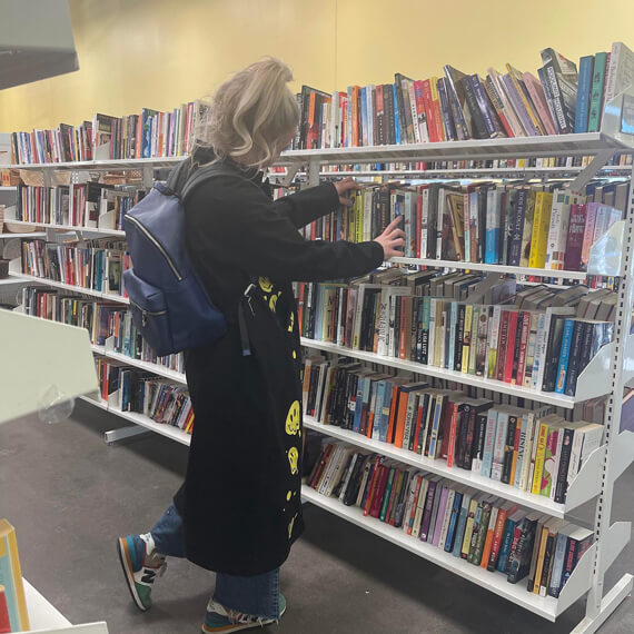 woman-by-book-display