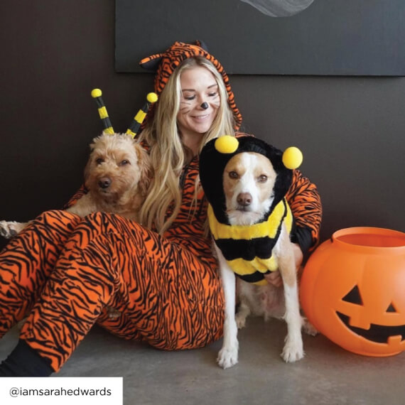 photo of sarah and 2 dogs in halloween costumes