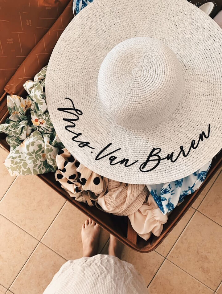 Photo of a sun hat with cursive text that states "Mrs. Van Buren"