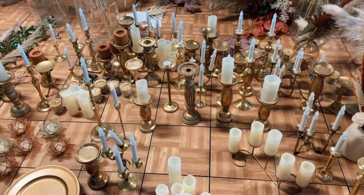 photo of candles and candle stick holders.