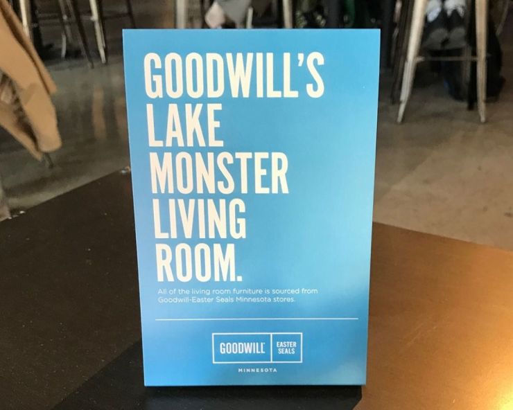 Table tent announcing Goodwill living room